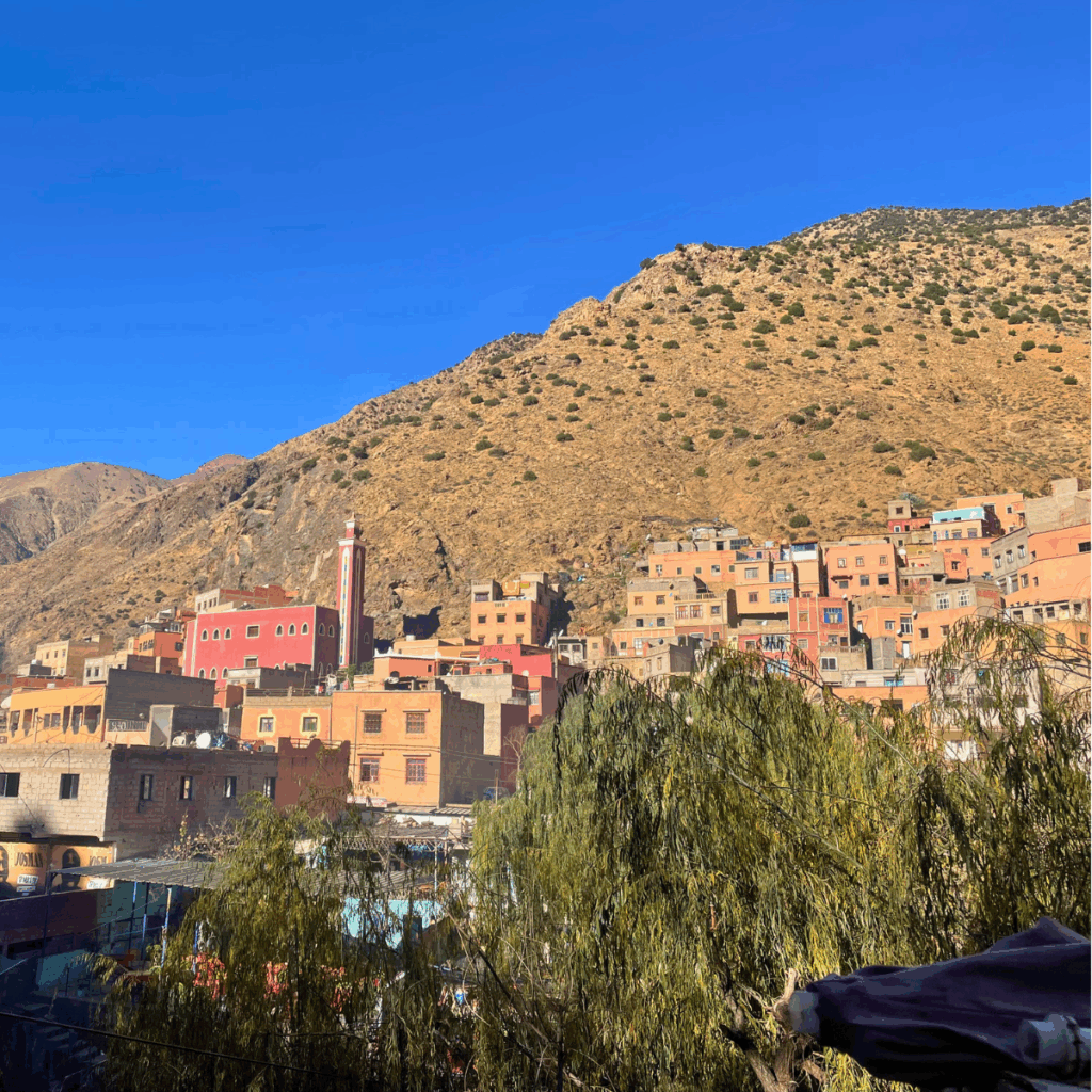Buildings positioned against the High Atlas Mountains in Setti Fadma