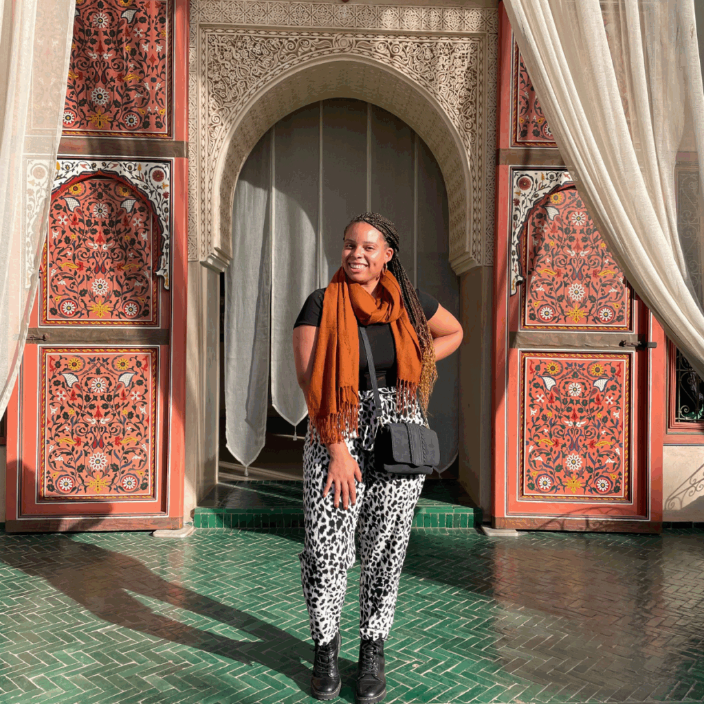 Joy poses in Le Jardin Secret